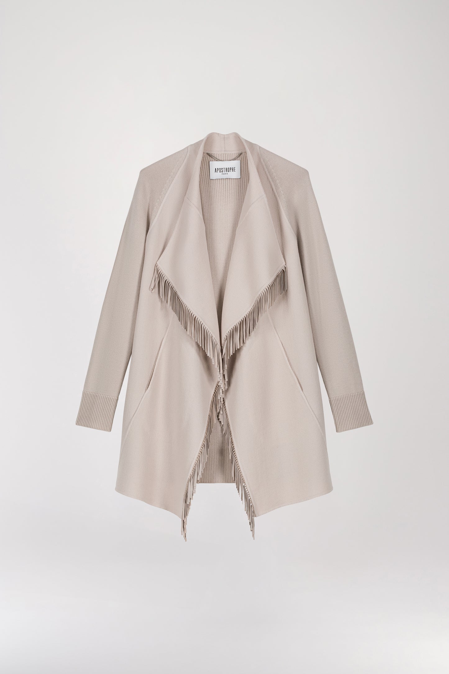 Bi-material mesh coat with concrete fringes