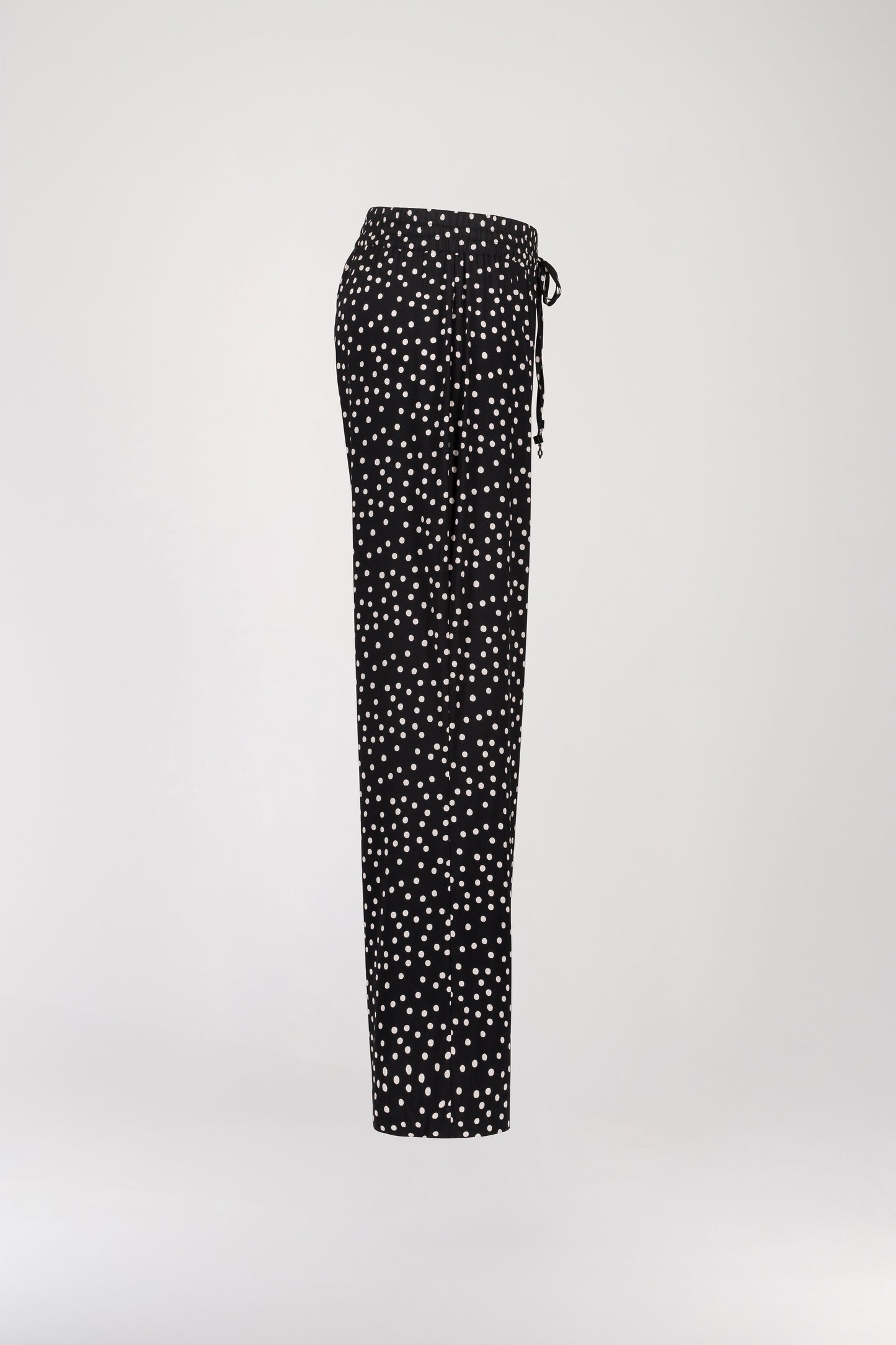 Flowing black polka dot printed pants