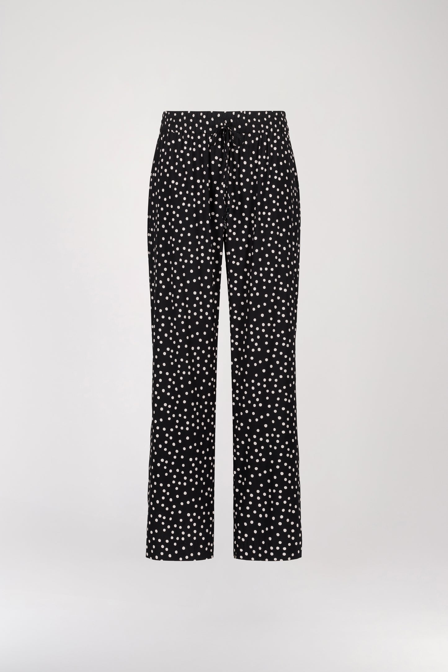 Flowing black polka dot printed pants