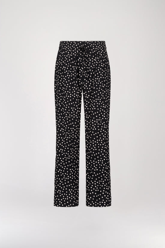 Flowing black polka dot printed pants