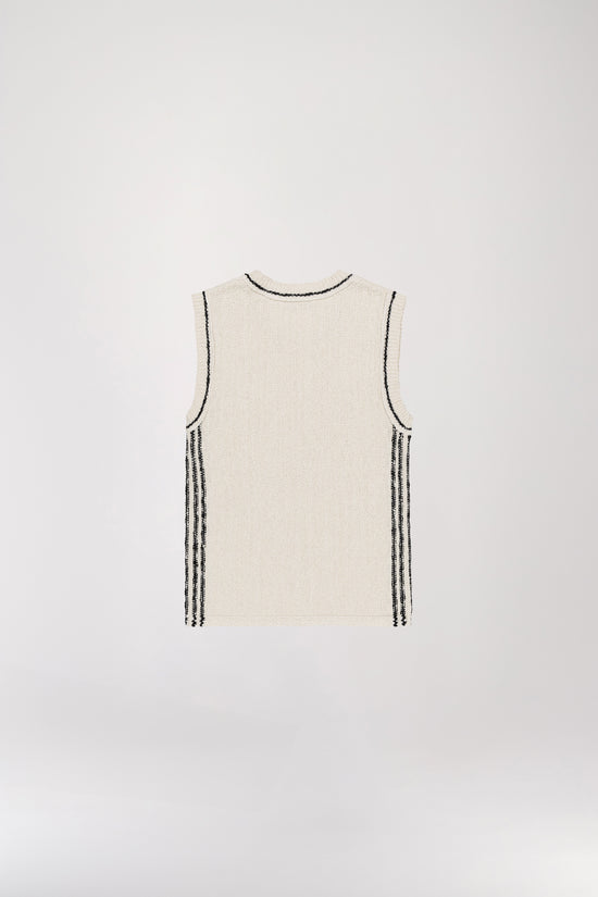 White sleeveless knit top