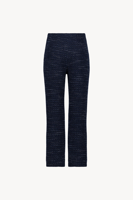 Pantalon droit en tweed marine. Sa ceinture intérieure souligne