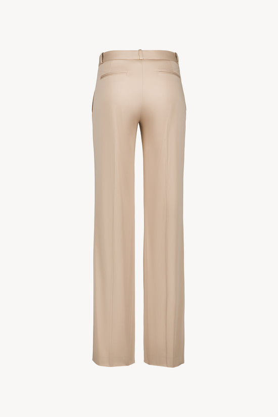Pantalon évasé en satin de coton beige .