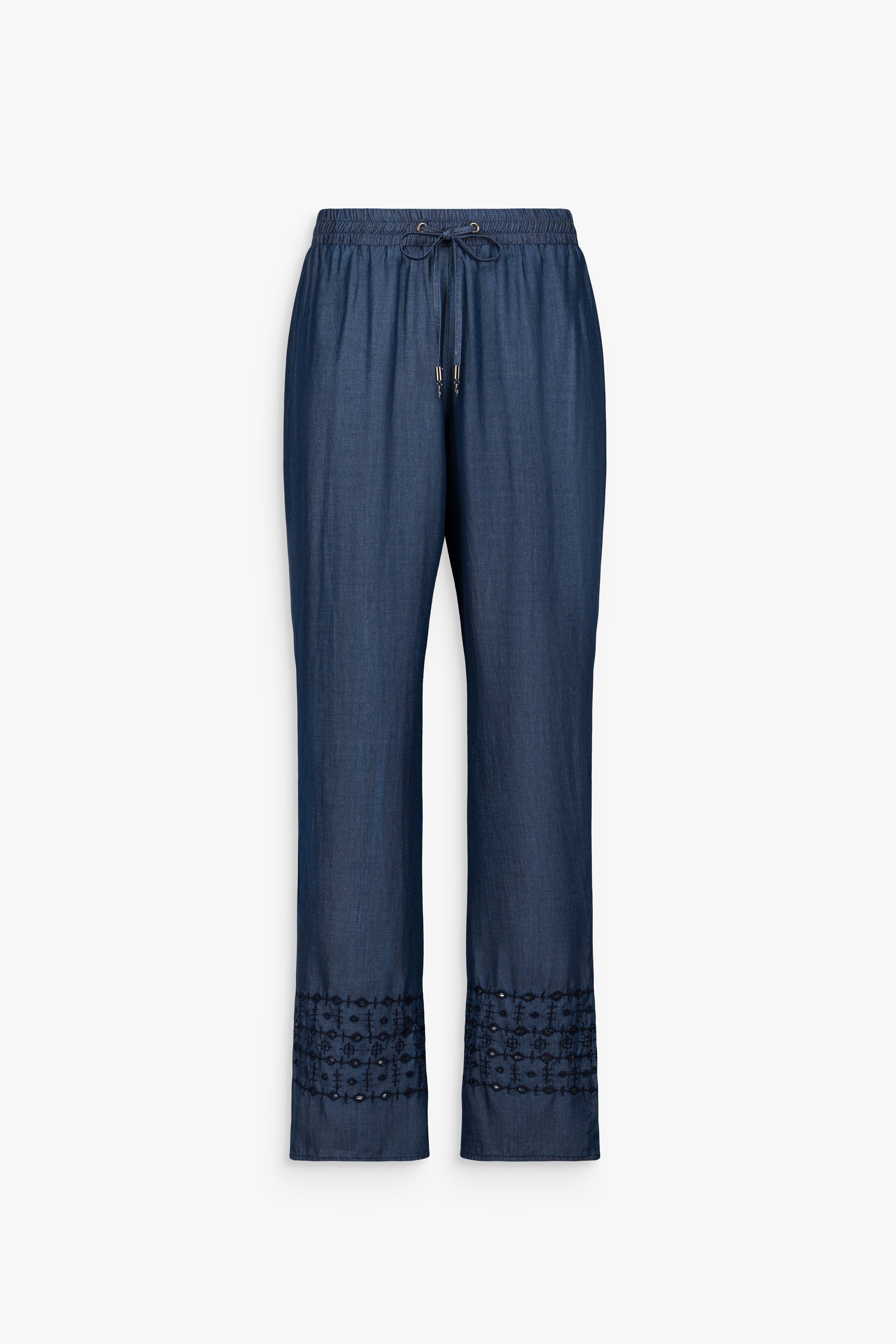 Pantalon droit en denim bleu délavé, fluide et léger. Taille élastique confortable et broderie délicate au bas des jambes