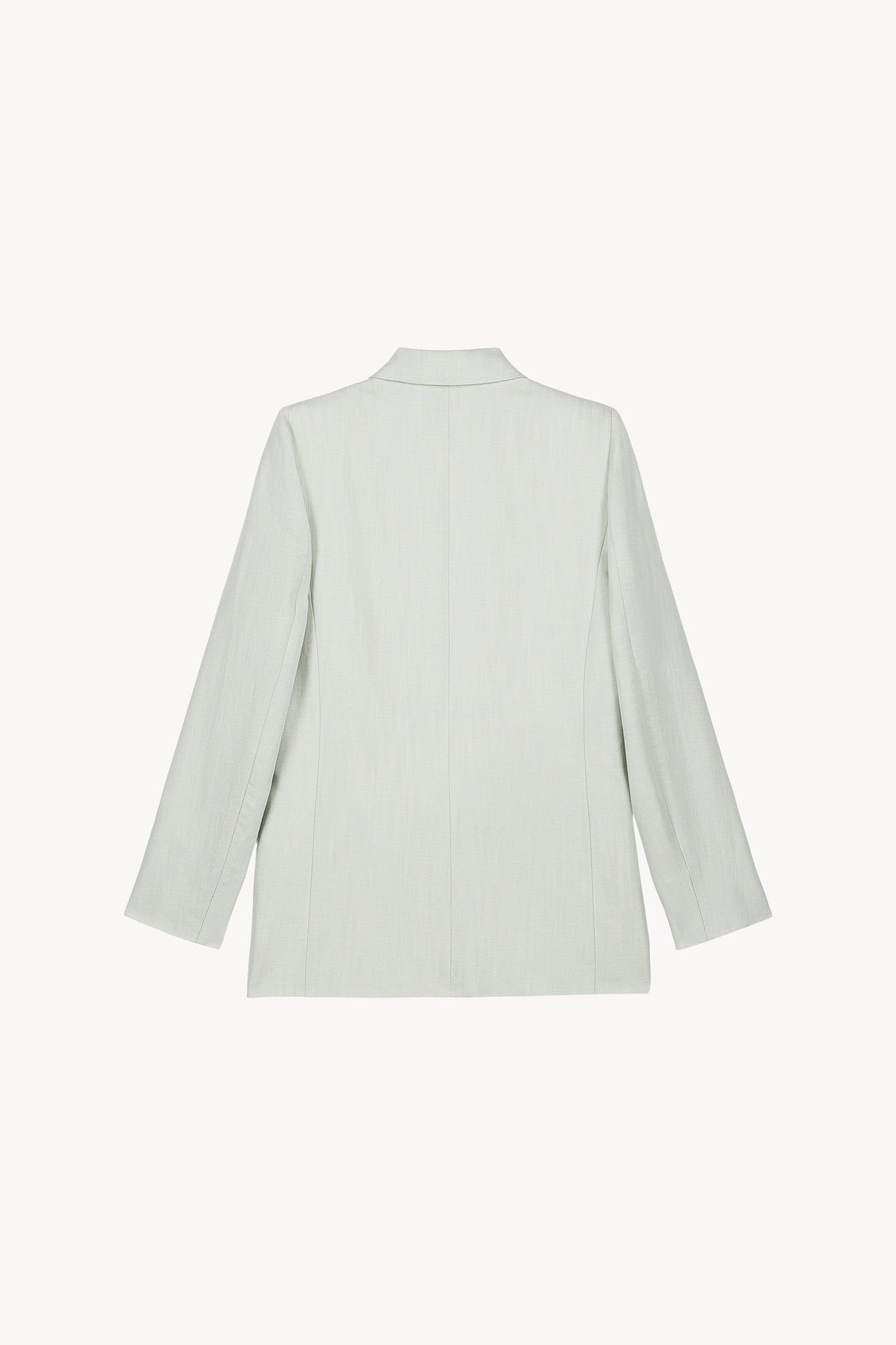 Une veste tailleur vert d'eau en lin-viscose, coupée avec soin, dotée de boutons ton sur ton et de poches passepoil, parfaite pour un style élégant et pratique.