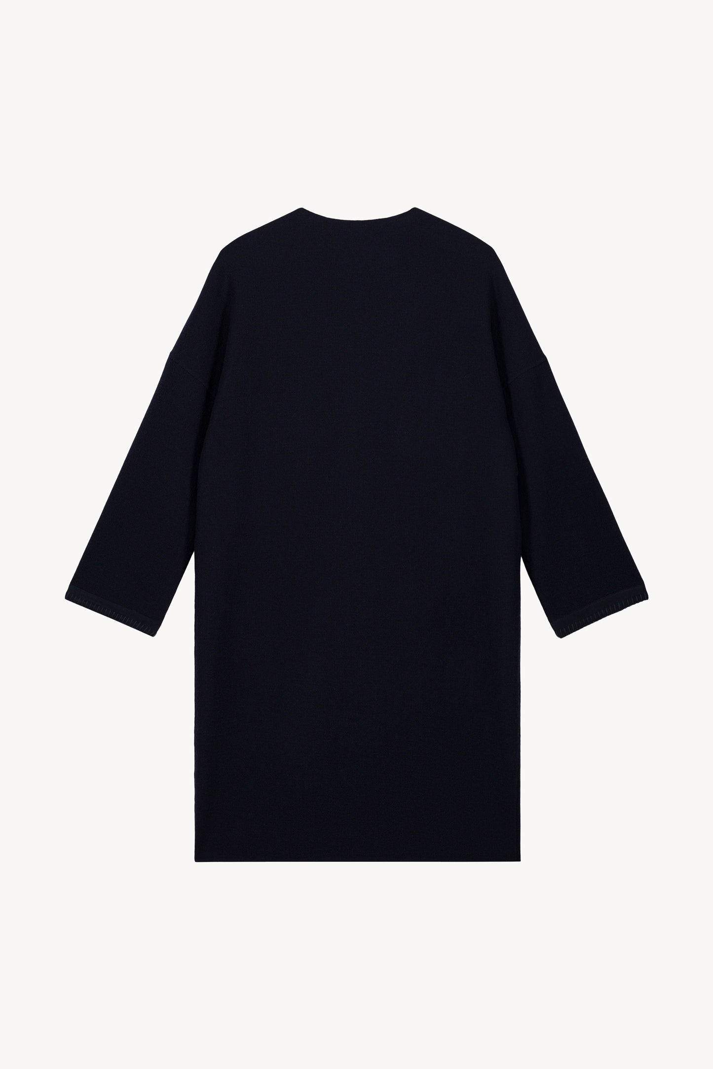 Manteau bi-matière marine, conçu avec des détails en daim et un col drapé fluide