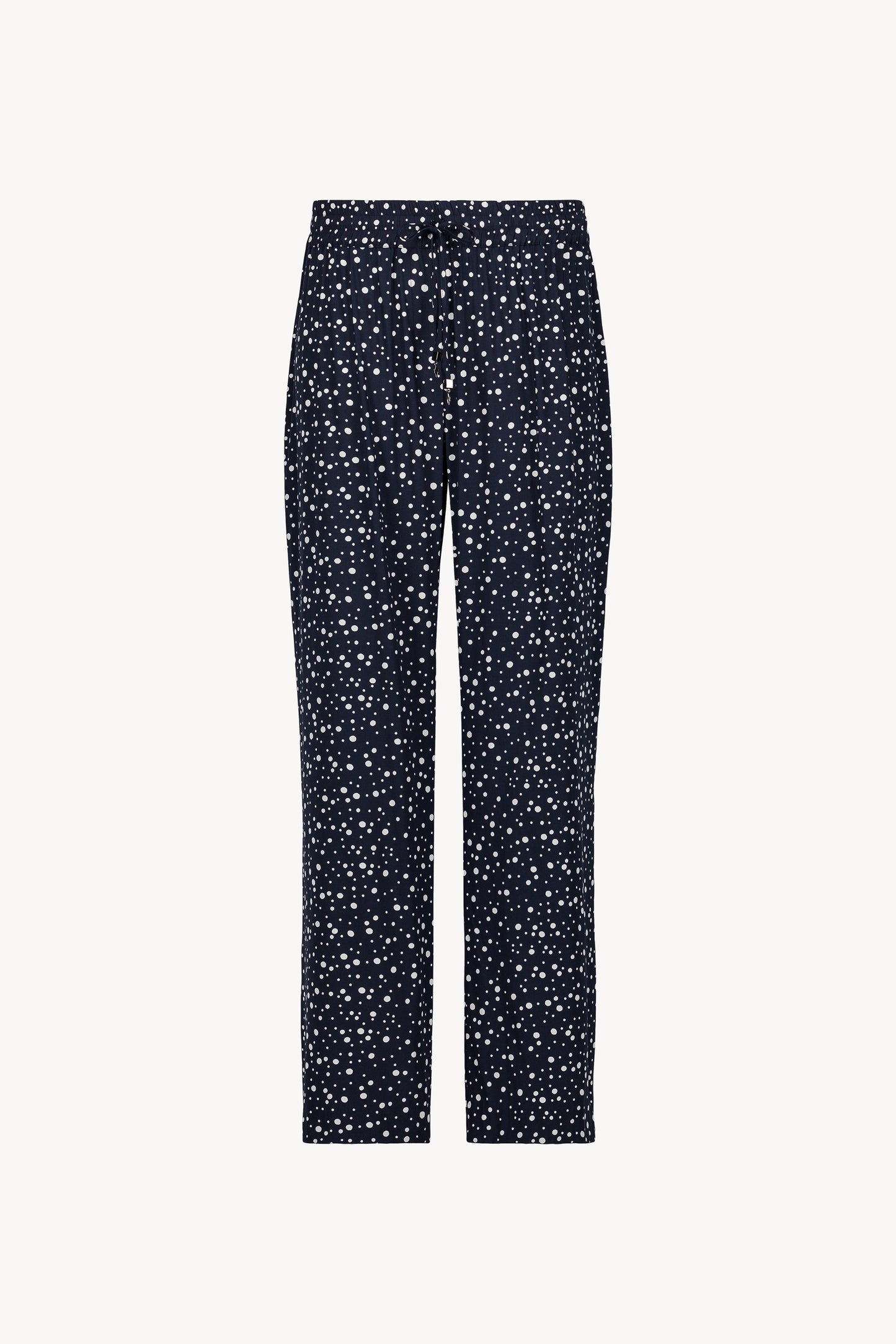Pantalon marine à pois, coupe fluide et taille élastiquée, avec cordon de serrage métallisé .