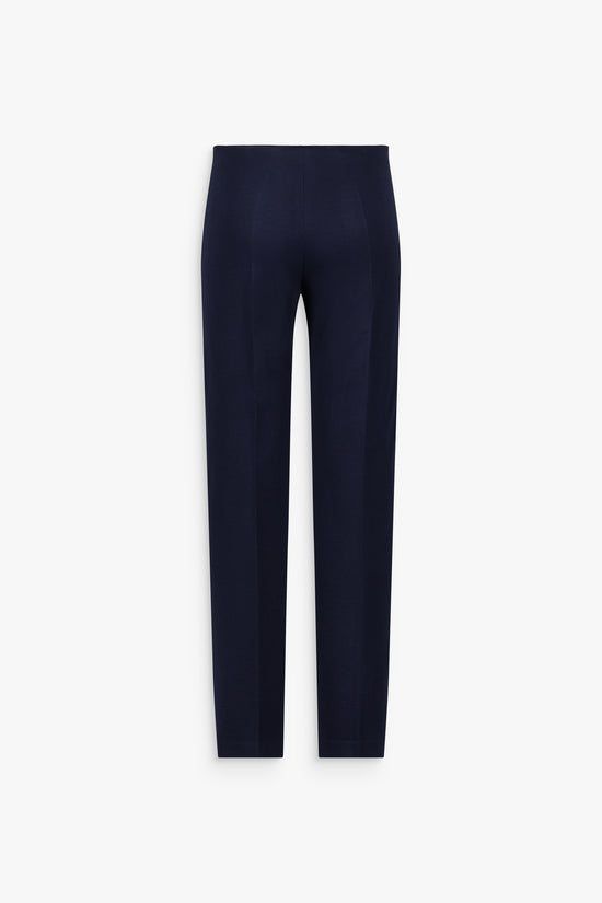 Pantalon droit marine, plis marqués et taille élastiquée pour une silhouette soignée.
