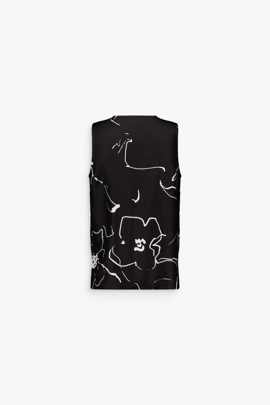 Haut noir fluide, orné de fleurs raffinées avec fentes latérales.