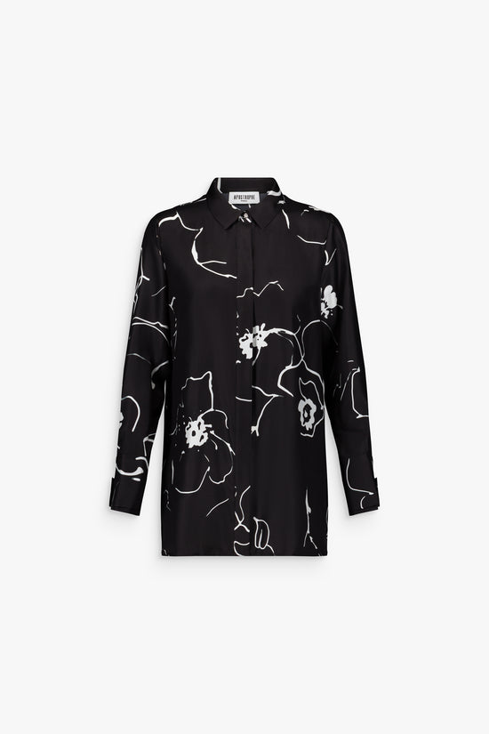 Chemise noire fleurie en soie, col mao et manches raglan pour une silhouette harmonieuse.