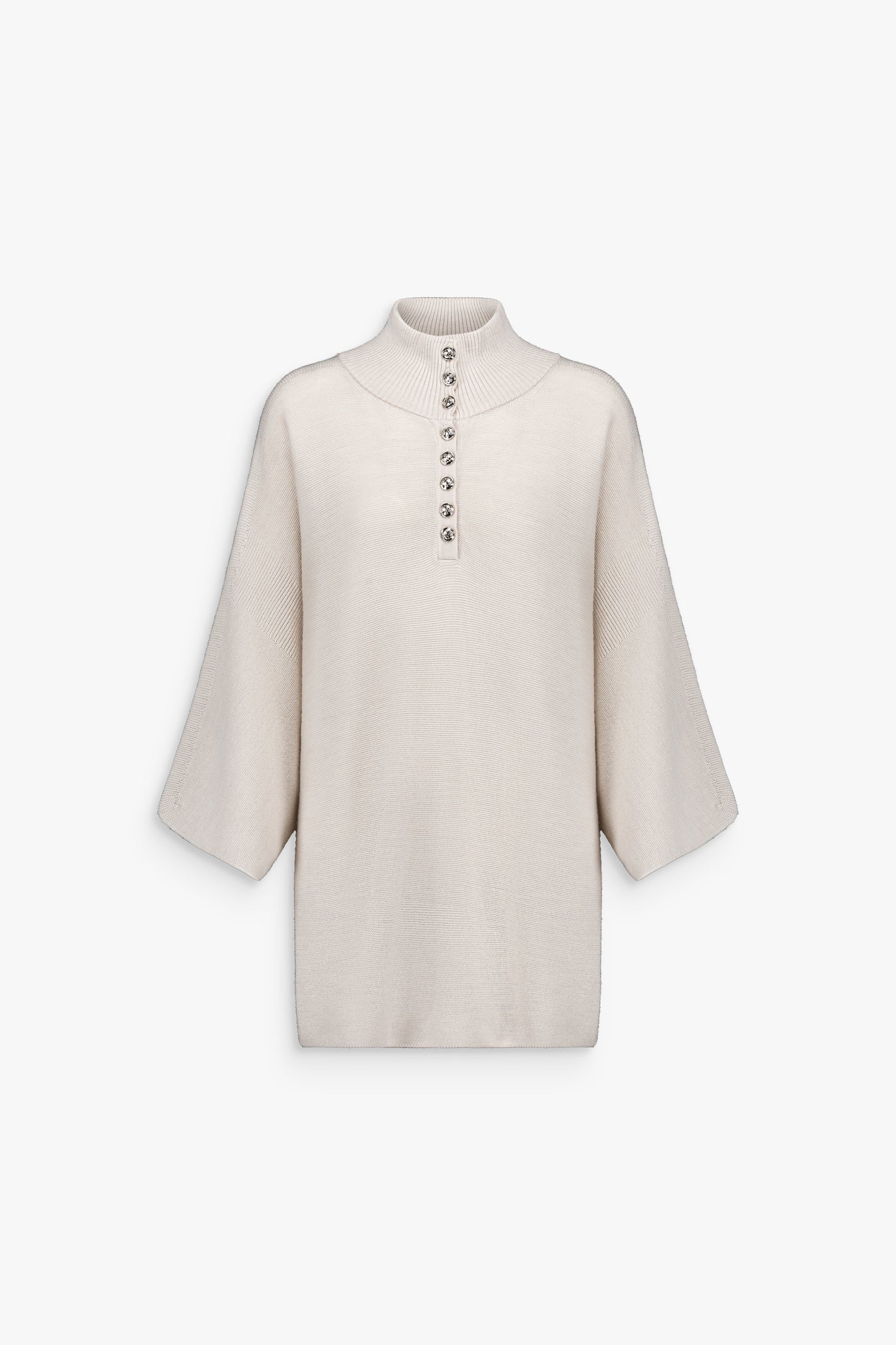 Pull en laine, couleur béton, coupe droite et raffinement minimaliste.