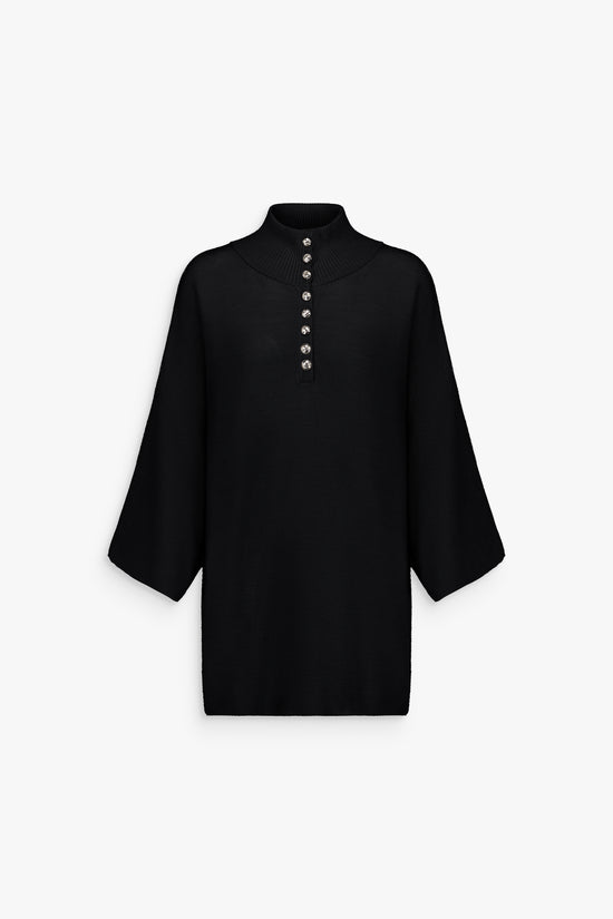 Pull col roulé en laine, noir profond, coupe droite et détails argentés.