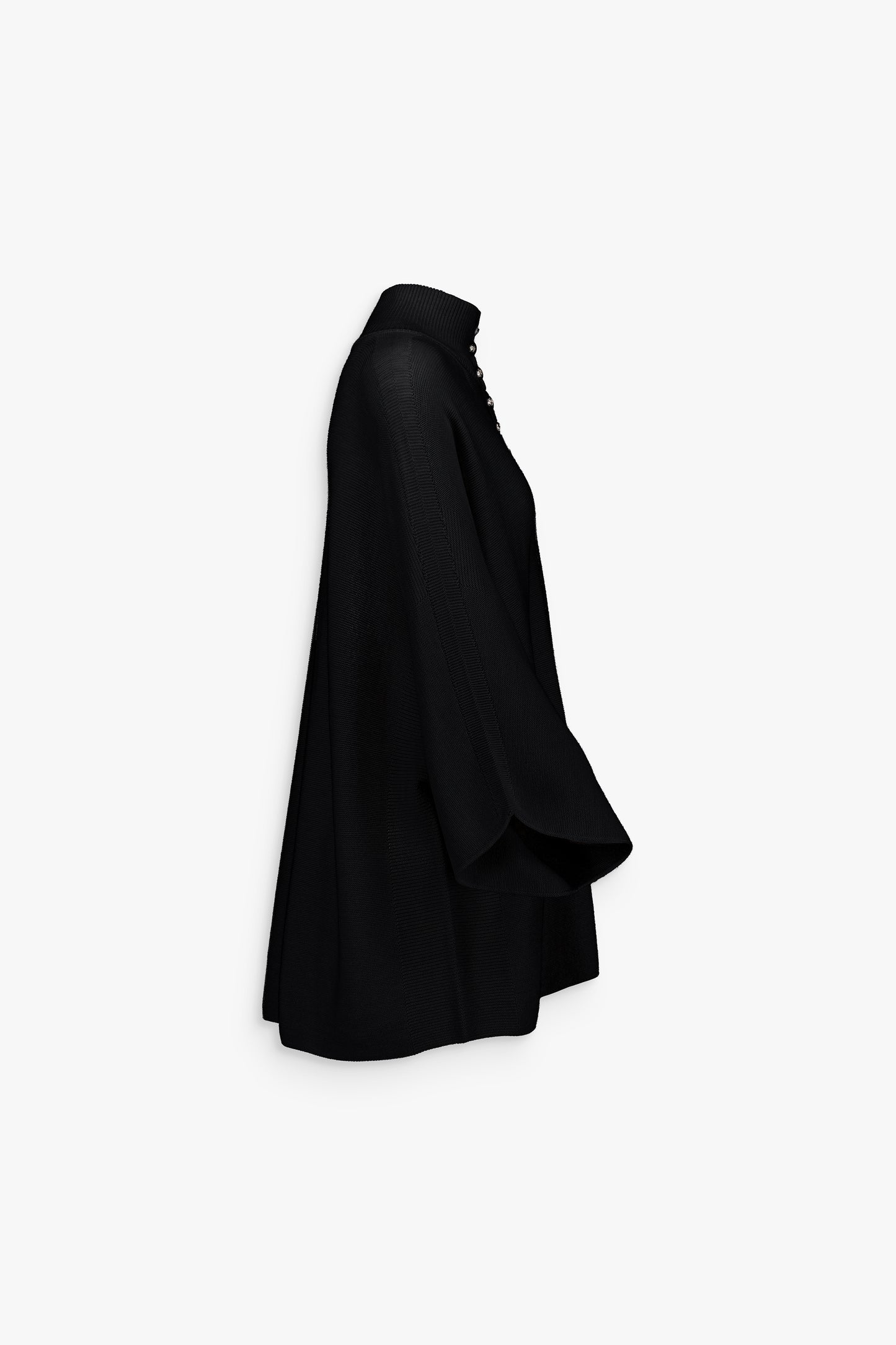 Pull en laine noir, coupe droite et raffinement minimaliste.
