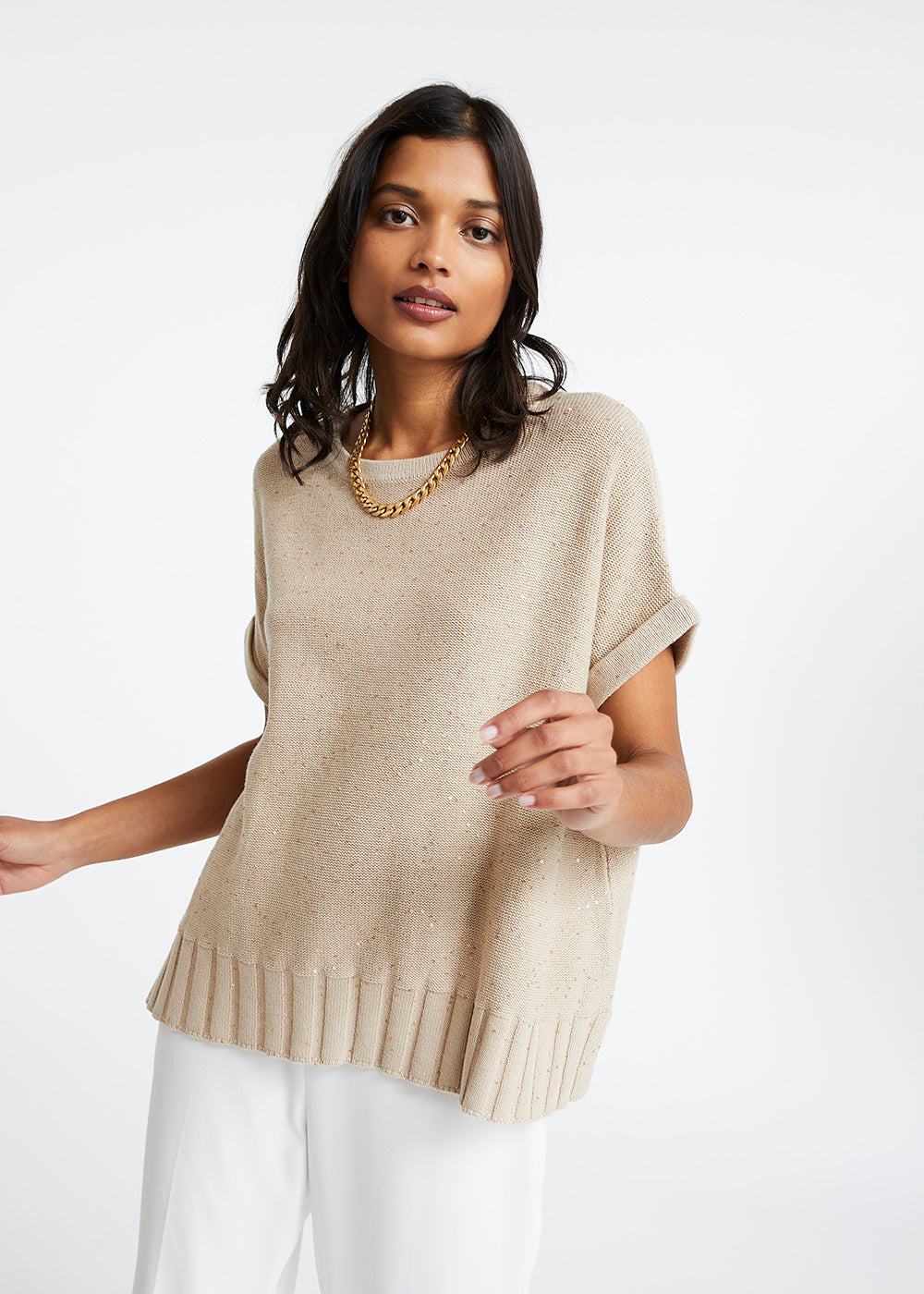 Pull ample beige à sequins